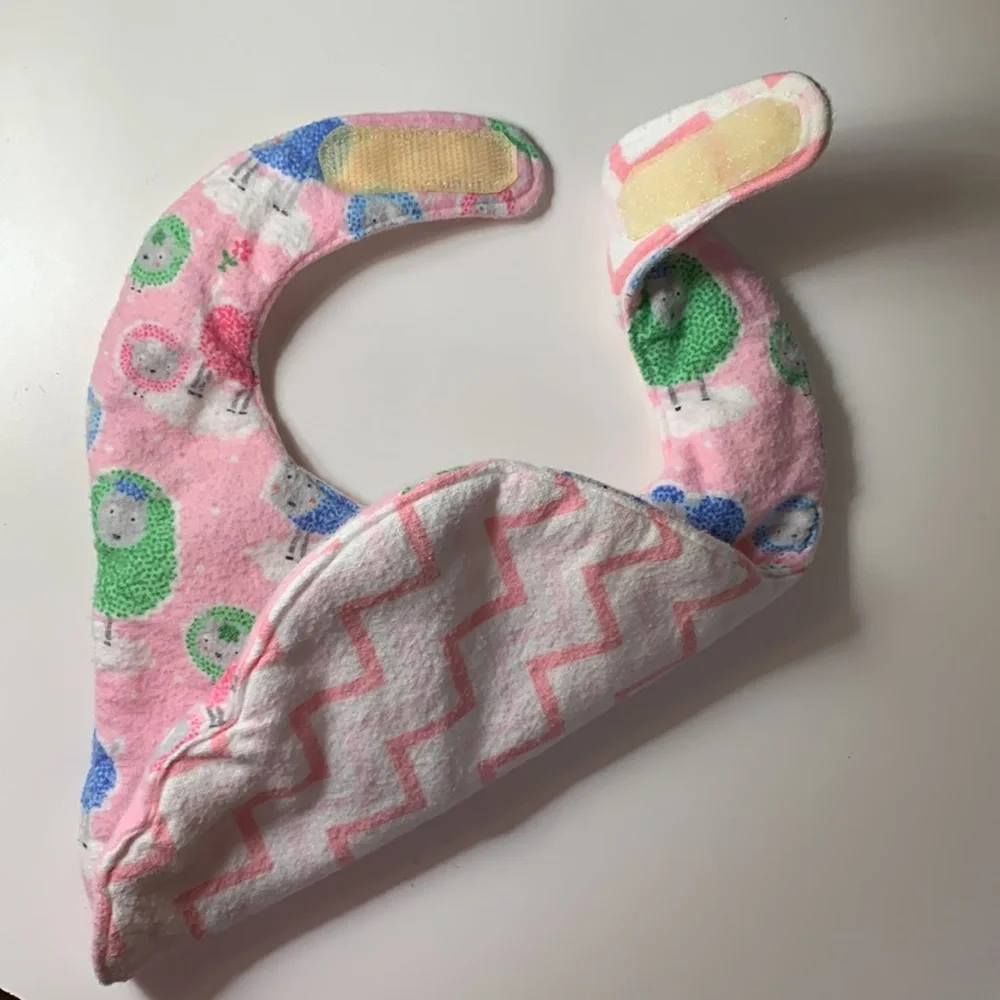 Set of 4 baby flannel bibs. Size OS,